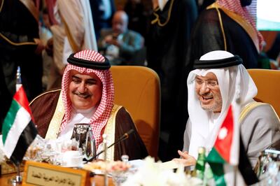 UAE Minister of State Anwar Gargash (R) and Bahrain's Foreign Minister Khalid bin Ahmed Al Khalifa (L) attend the Arab Foreign meeting in Riyadh, Saudi Arabia April 12, 2018. REUTERS/Faisal Al Nasser