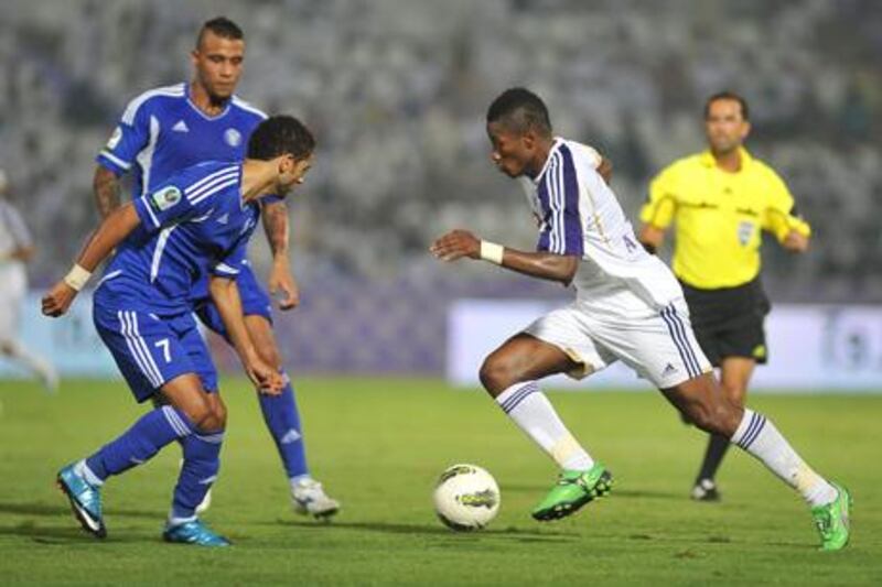 Asamoah Gyan, right, in action for Al Ain against Al Nasr.
