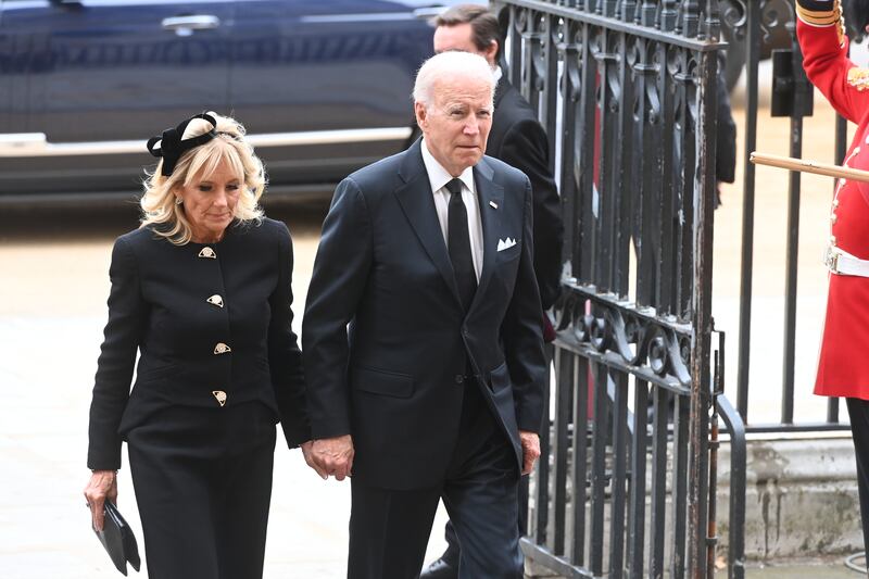 US President Joe Biden and first lady Jill Biden arrive for the funeral. Getty Images 