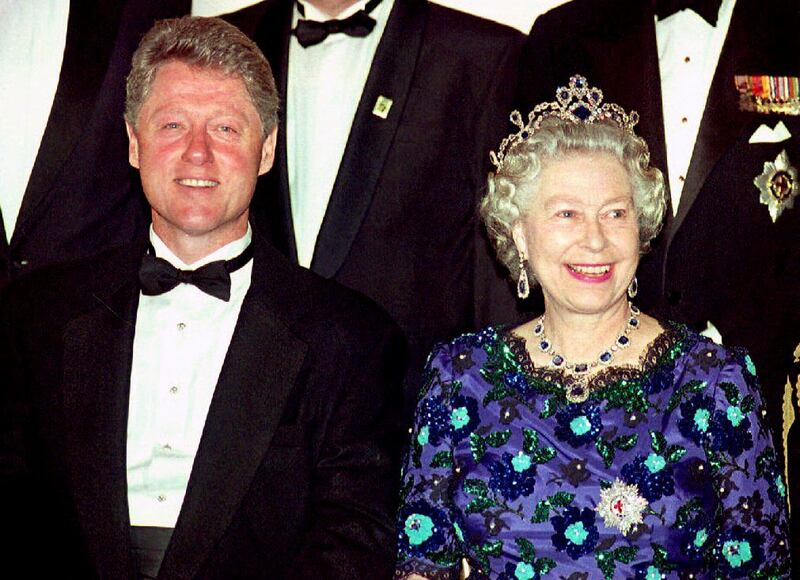Bill Clinton, the US president at the time, and Britain's Queen Elizabeth II smile for the cameras before a celebratory banquet for the 50th anniversary of D-Day on June 3, 1994. AFP