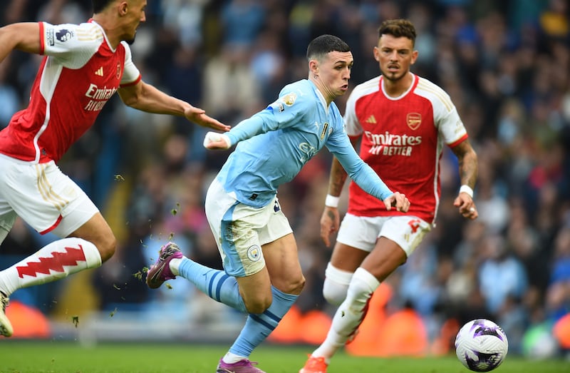 Manchester City's Phil Foden breaks free against Arsenal on Sunday. EPA