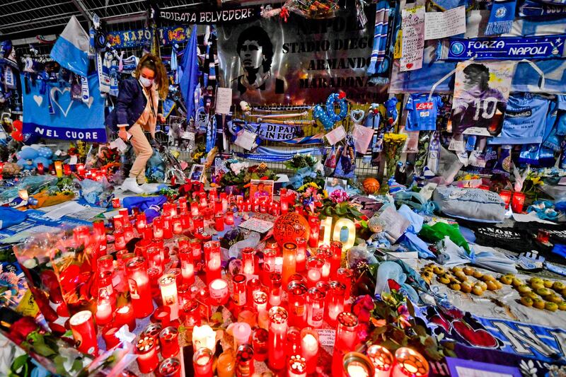 Tributes to the late Argentina football star Diego Maradona outside his former club Napoli's San Paolo Stadium in Italy on Friday, November 27. EPA