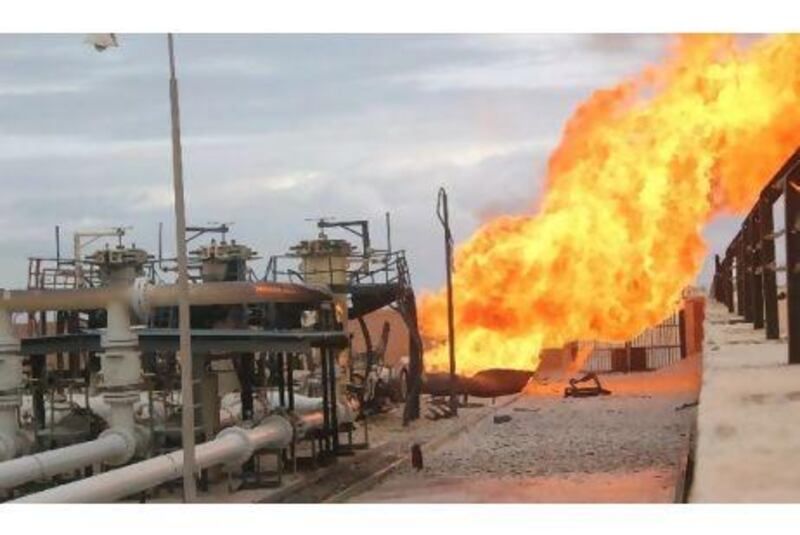 In el Arish, Egypt yesterday, huge flames erupt from the explosion at a lucrative gas pipeline that supplies energy to Israel and Jordan.