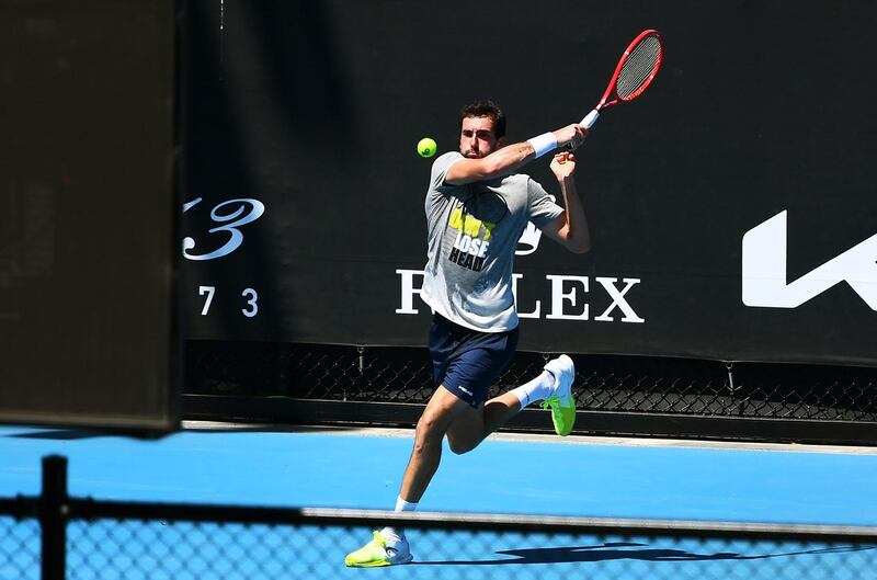 Croatia's Marin Cilic hits a return during a practise session in Melbourne on January 25, 2021, with players allowed to train while serving quarantine for two weeks ahead of the Australian Open. AFP