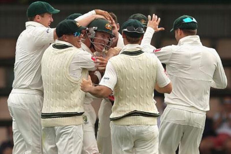 Michael Clarke, far right, has had mixed results with a young Australia squad, but is confident ahead of their Tests against India.