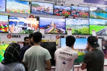 DUBAI, UNITED ARAB EMIRATES - OCTOBER 02, 2018. Smart TVs on display at GITEX Shopper 2018. (Photo by Reem Mohammed/The National) Reporter: Section: NA