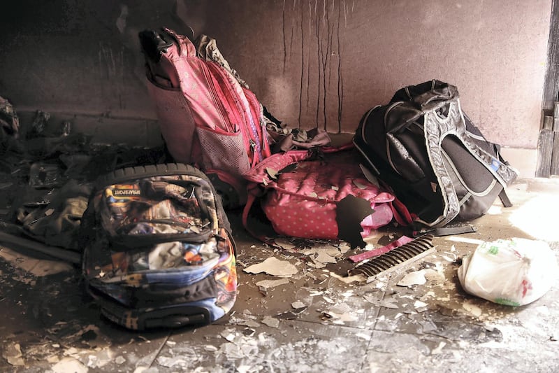 FUJAIRAH , UNITED ARAB EMIRATES , JAN 22 – 2018 :- Inside view of the house where seven Emirati children four girls and three boys died of smoke inhalation on Monday morning house fire at Rul Dhadna village in Fujairah. School bags of the kids.  (Pawan Singh / The National) For News. Story by Ruba Haza