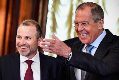 Russian Foreign Minister Sergei Lavrov (R) welcomes his Lebanese counterpart Gebran Bassil (L) during their meeting, in Moscow, on August 20, 2018 (Photo by Alexander NEMENOV / AFP)
