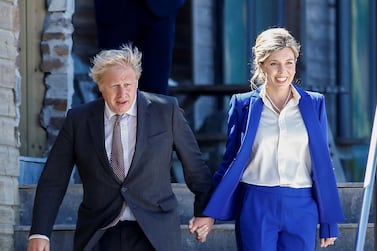 Carrie Johnson, wife of British Prime Minister Boris Johnson, wears a rented suit by Amanda Wakeley. Getty Images