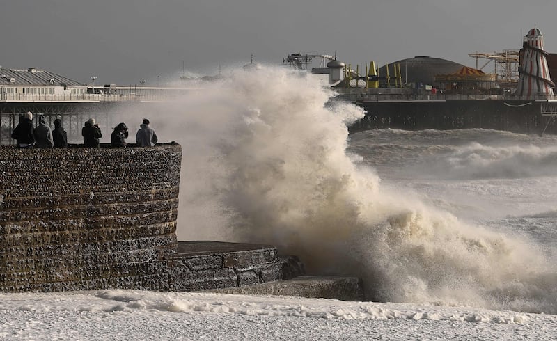 'Outbreaks of heavy rain or showers will accompany the strong winds,' the Met Office said. AFP