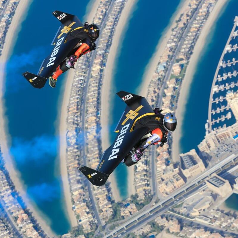 Yves Rossy with his new jetpacking partner Vince Reffet in ‘the world’s first twin human formation flight’. Courtesy Yves Rossy