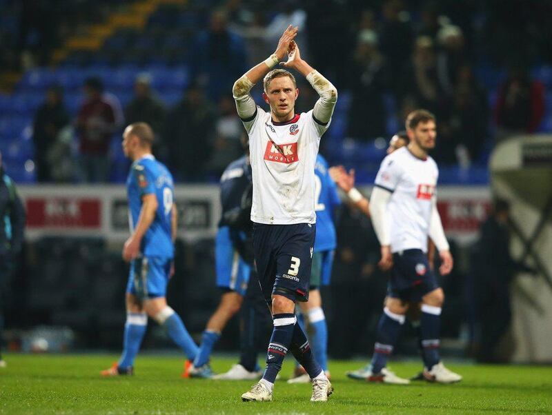 Dean Moxey of Bolton Wanderers applauds the supporters after Tuesday night's FA Cup replay against Eastleigh. Alex Livesey / Getty Images