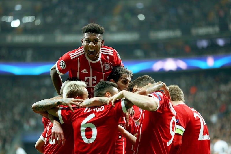 epa06604083 Bayern Munich's Thiago Alcantara (front 2-L) celebrates with his teammates after scoring the 1-0 lead during the UEFA Champions League round of 16, second leg soccer match between Besiktas Istanbul and FC Bayern Munich in Istanbul, Turkey, 14 March 2018.  EPA/ERDEM SAHIN