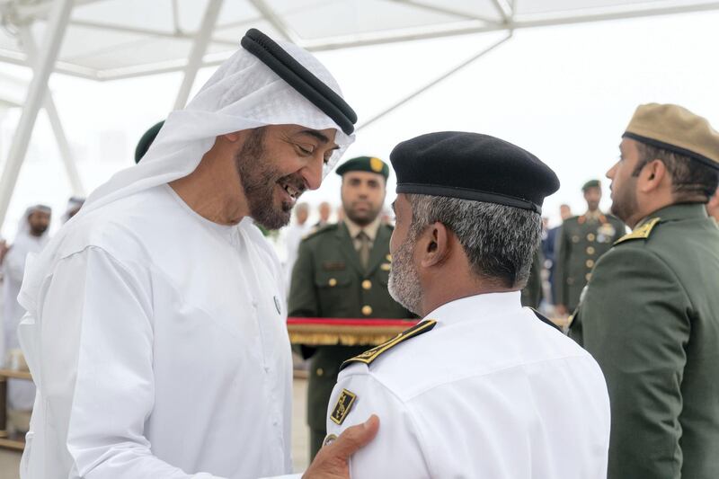 ABU DHABI, UNITED ARAB EMIRATES - April 23, 2018: HH Sheikh Mohamed bin Zayed Al Nahyan Crown Prince of Abu Dhabi Deputy Supreme Commander of the UAE Armed Forces (L), awards a member of the UAE Armed Forces with a Medal of Bravery for his service in Yemen, during a Sea Palace barza.

( Rashed Al Mansoori / Crown Prince Court - Abu Dhabi )