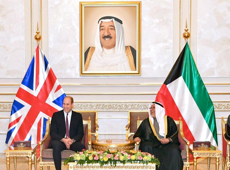 Britain's Prince William, the Duke of Cambridge, is received by Kuwait's Minister of the Amiri Diwan (Royal Palace) Affairs, Sheikh Ali al-Jarrah al-Sabah.  EPA