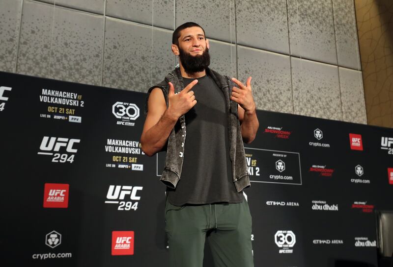 Khamzat Chimaev poses for photos after speaking to the media ahead of his fight against Kamaru Usman at UFC 294.