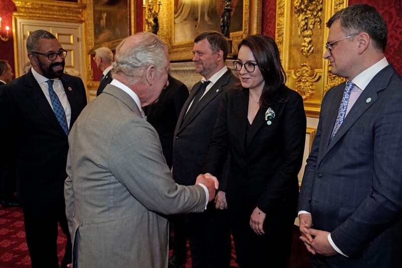 Mr Cleverly and King Charles meet officials from Ukraine. PA