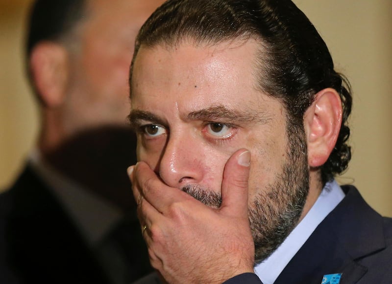 FILE - This Thursday, Oct. 20, 2016 file photo, Former Lebanese Prime Minister Saad Hariri reacts after he announced his support to the Christian leader Michel Aoun to be Lebanese president, in Beirut, Lebanon. Hariri resigned from his post Saturday, Nov 4, 2017 during a trip to Saudi Arabia in a surprise move that plunged the country into uncertainty amid heightened regional tensions. (Hussein Malla, File)
