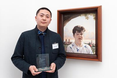 Third prize winner Zhu Tongyao with his portrait- Simone. Jorge Herrera