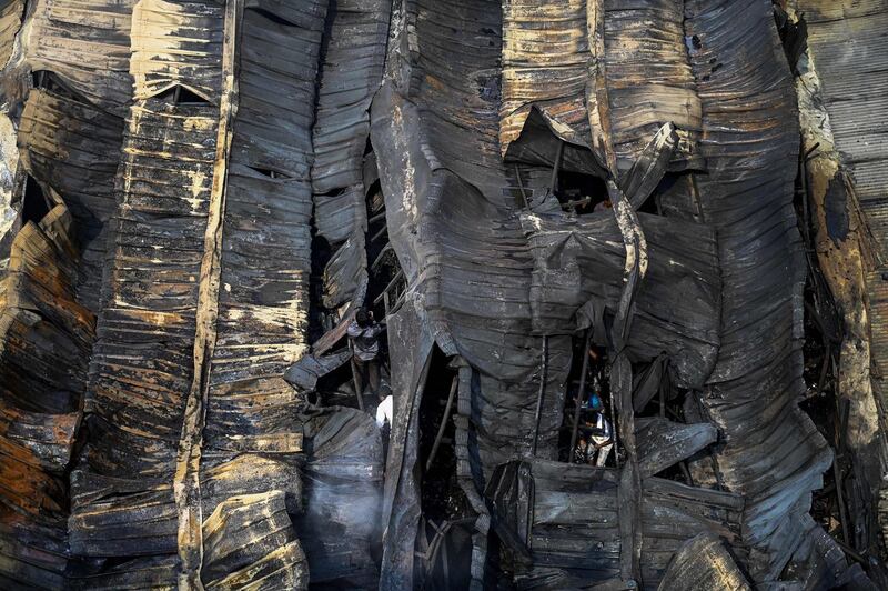 A burnt makeshift market is pictured after a fire broke out in Dhaka, Bangladesh. AFP
