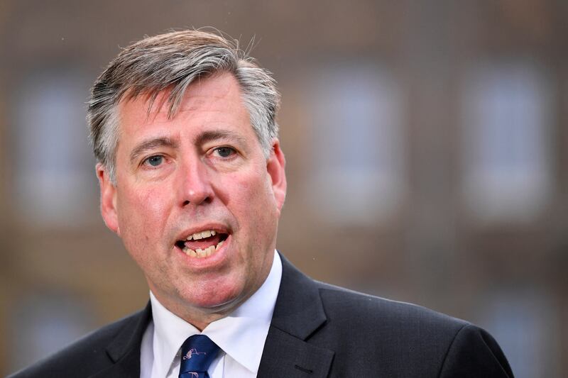 British Conservative MP Sir Graham Brady speaks to members of the media announcing the decision to hold a vote of no confidence, outside of the Houses of Parliament. Reuters