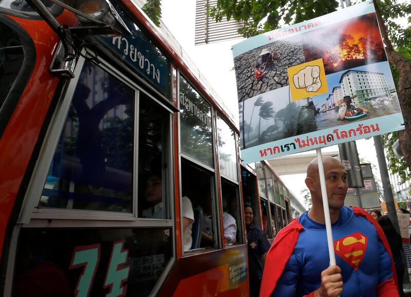 People march toward the Ministry of Natural Resources and Environment in Bangkok. EPA