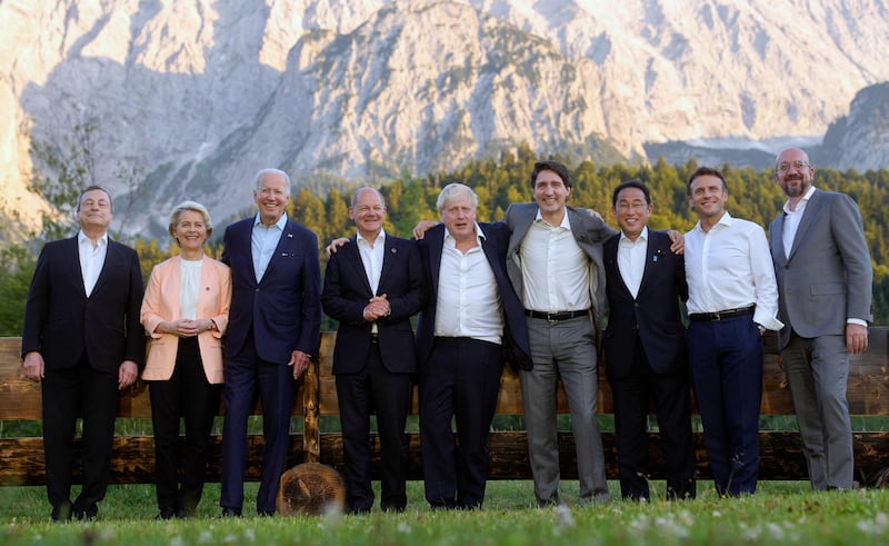 From left, Mr Draghi, Ms von der Leyen, Mr Biden, Mr Scholz, Mr Johnson, Mr Trudeau, Mr Kishida, Mr Macron and Mr Michel. AFP