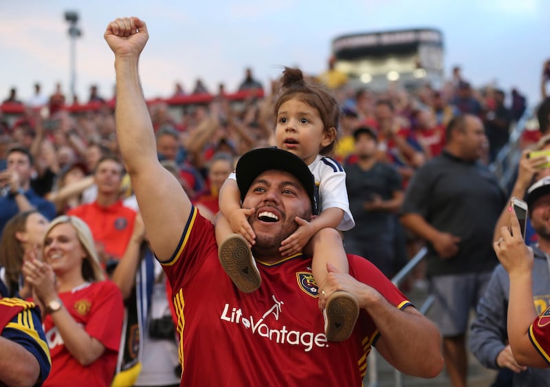 Real Salt Lake fans celebrate after the team scored against Manchester United. Rick Bowmer / AP Photo