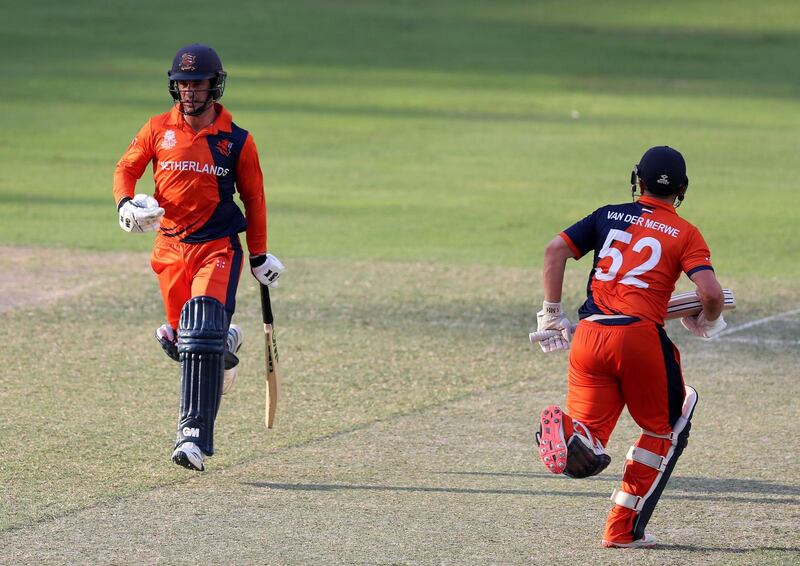 Dubai, United Arab Emirates - October 14, 2019: The Netherland's Ryan ten Doeschate (L) and Roelof van der Merwe bat during the ICC Mens T20 World cup qualifier warm up game between the Ireland and The Netherlands. Monday the 14th of October 2019. International Cricket Stadium, Dubai. Chris Whiteoak / The National