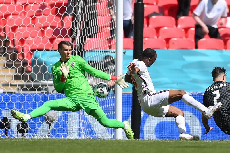 England's forward Raheem Sterling scores the opening against Croatia at Wembley Stadium. AFP