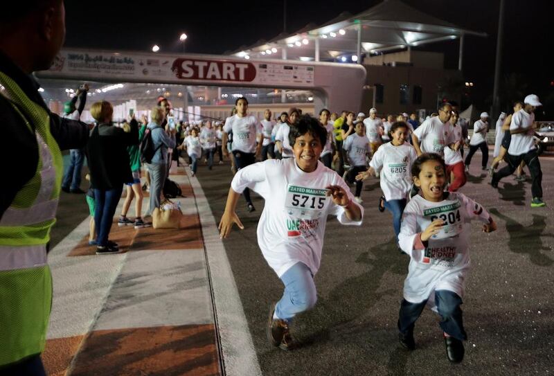 Many children took part in the 5K race at Yas Marina Circuit on Friday night. Christopher Pike / The National