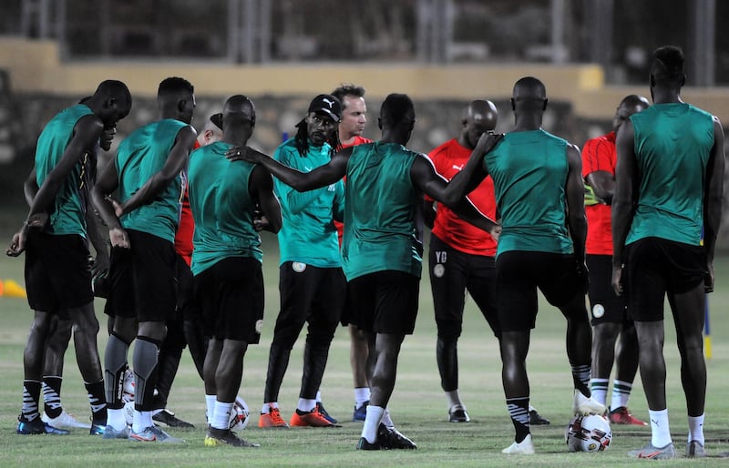 Cisse talks to players. Reuters