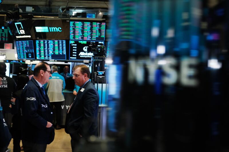 NEW YORK, NEW YORK - NOVEMBER 04: Traders work on the floor of the New York Stock Exchange (NYSE) on November 04, 2019 in New York City. U.S. stocks finished at records highs on Monday with the Dow Jones Industrial Average rising 114 points to close at a record high.   Spencer Platt/Getty Images/AFP
== FOR NEWSPAPERS, INTERNET, TELCOS & TELEVISION USE ONLY ==
