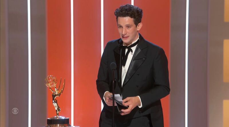 Josh O'Connor accepts the award for Outstanding Lead Actor in a Drama Series for 'The Crown'. AP