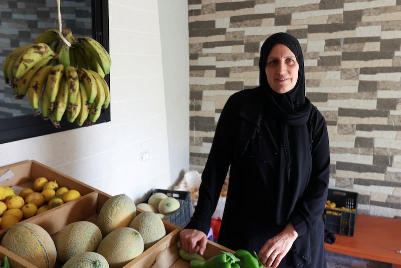 "My house here is very far from the village," says Khadija Shreim. "I have a group (on Whatsapp) with all the women I know, they call me the 'mukhtara' (mayor) of the village here, I know everyone in the village. I created a group and I send the prices daily, every morning at 9:00 a.m."
