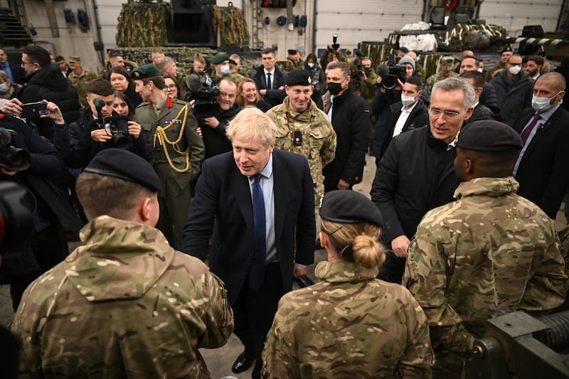 British Prime Minister Boris Johnson and Nato Secretary General Jens Stoltenberg meet troops from the alliance in Tallinn, Estonia, on March 1. PA