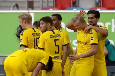 epa08483253 Erling Haaland of Borussia Dortmund (2R) celebrates scoring a goal with teammates during the Bundesliga match between Fortuna Duesseldorf and Borussia Dortmund at Merkur Spiel-Arena in Duesseldorf, Germany, 13 June 2020. EPA/LARS BARON / POOL DFL regulations prohibit any use of photographs as image sequences and/or quasi-video.