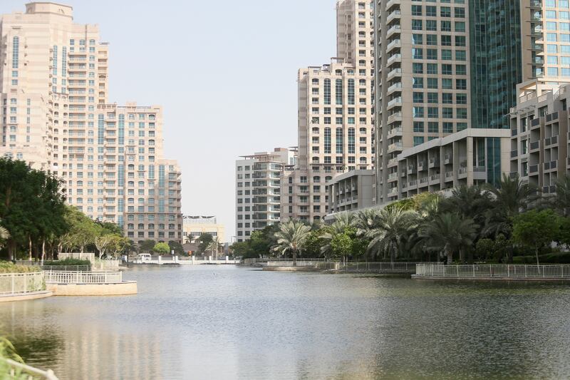 DUBAI, UNITED ARAB EMIRATES. August 19, 2015 - Stock photograph of residential buildings and the lake in The Greens in Dubai, August 19, 2015. (Photo by: Sarah Dea/The National, Story by: Standalone)
 *** Local Caption ***  SDEA190815-TheGreens_Stock02.JPG