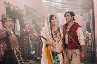 Naomi Scott as Jasmine and Mena Massoud as Aladdin in Disney’s live-action adaptation of ALADDIN, directed by Guy Ritchie. Courtesy Disney