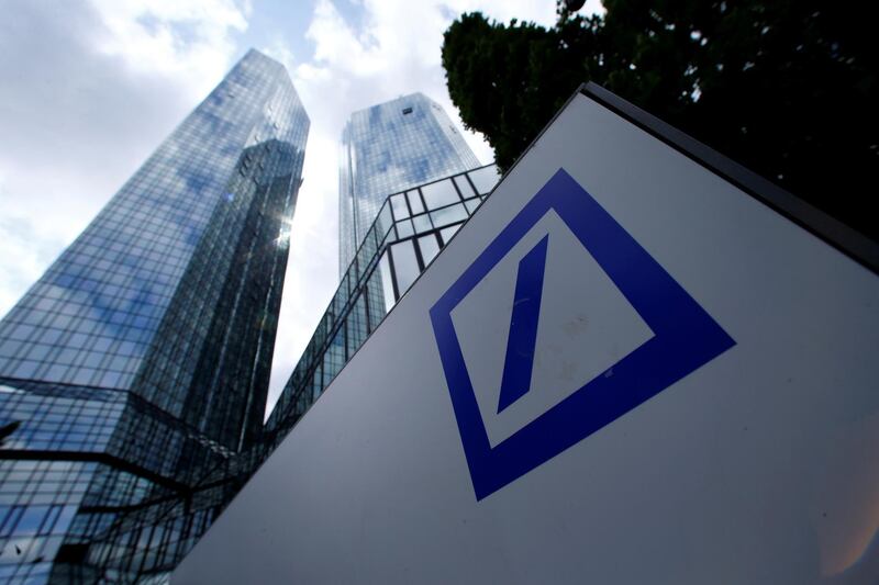FILE PHOTO: A Deutsche Bank logo adorns a wall at the company's headquarters in Frankfurt, Germany, June 9, 2015. REUTERS/Ralph Orlowski/File Photo