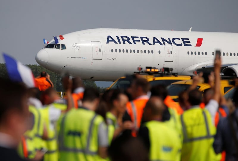 The France football team arrive at Charles de Gaulle Airport. Pascal Rossignol / Reuters