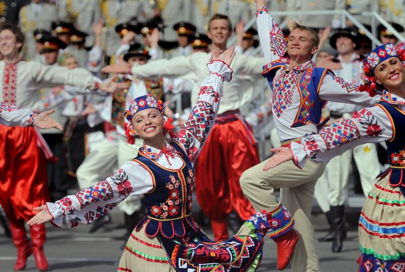 Ukrainian artists in traditional national dresses perform during a celebration of Independance Day. Tatyana Zenkovich/EPA