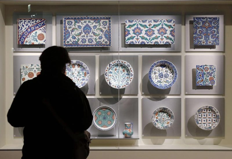 Ceramic Iznik pottery plates and tiles from the Ottoman Empire displayed at the Louvre Museum in Paris before the works are transferred to the Louvre in Abu Dhabi. Francois Guillot/ AFP 