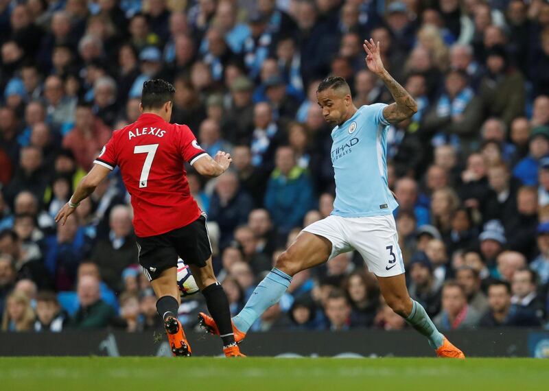 Soccer Football - Premier League - Manchester City vs Manchester United - Etihad Stadium, Manchester, Britain - April 7, 2018   Manchester United's Alexis Sanchez in action with Manchester City's Danilo                   REUTERS/Russell Cheyne    EDITORIAL USE ONLY. No use with unauthorized audio, video, data, fixture lists, club/league logos or "live" services. Online in-match use limited to 75 images, no video emulation. No use in betting, games or single club/league/player publications.  Please contact your account representative for further details.