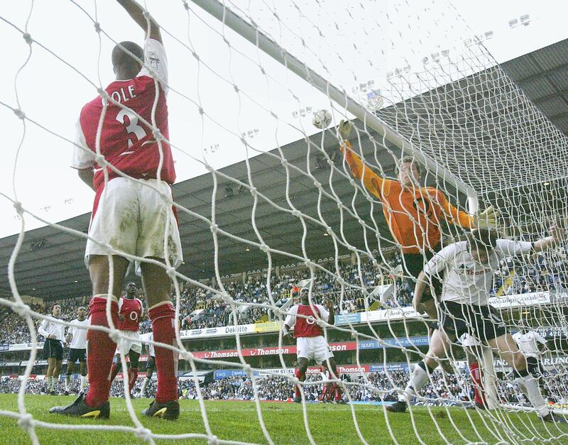 LONDON - APRIL 25:  Jens Lehmann of Arsenal clashes with Robbie Keane of Spurs during the FA Barclaycard Premiership match between Tottenham Hotspur and Arsenal at White Hart Lane on April 25, 2004 in London.  (Photo by Ben Radford/Getty Images)