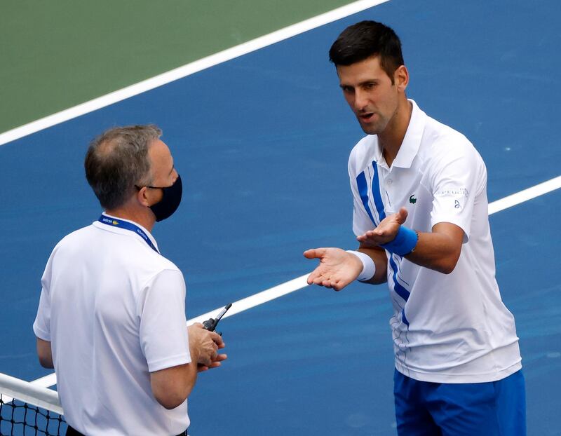 Novak Djokovic  talks to the head of officiating at the International Tennis Federation Soeren Friemel. EPA