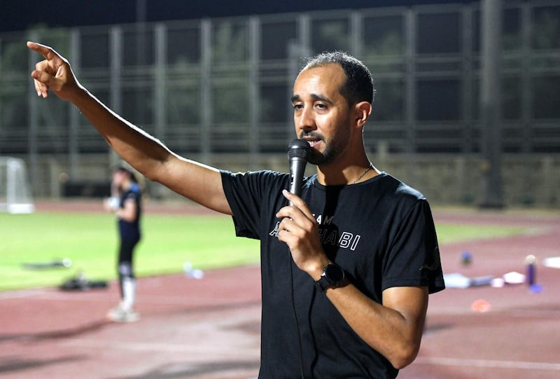 Abu Dhabi Running Team-AD Youssef Rochdi, 37, founder and coach of Abu Dhabi Running Team, leads his programme at Zayed Sports complex in Abu Dhabi on June 2, 2021. Khushnum Bhandari / The National 
Reporter: Haneen Dajani News