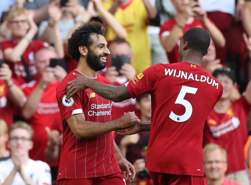 Soccer Football - Premier League - Liverpool v Arsenal - Anfield, Liverpool, Britain - August 24, 2019  Liverpool's Mohamed Salah celebrates scoring their third goal with Georginio Wijnaldum  Action Images via Reuters/Carl Recine  EDITORIAL USE ONLY. No use with unauthorized audio, video, data, fixture lists, club/league logos or "live" services. Online in-match use limited to 75 images, no video emulation. No use in betting, games or single club/league/player publications.  Please contact your account representative for further details.