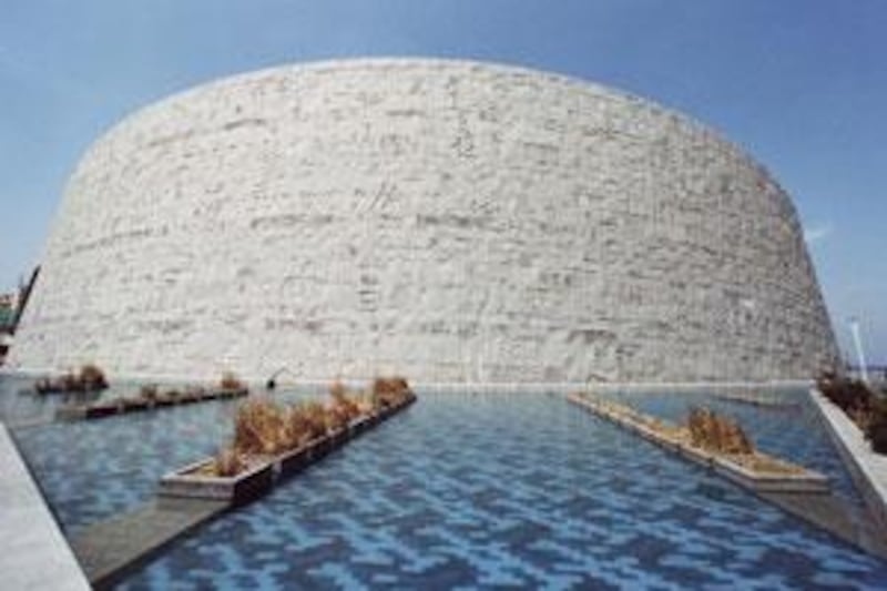 An outer wall constructed with 6,000 granite blocks and containing 4,200 symbols from 120 languages symbolises the long heritage of human knowledge that the library aims to embody.