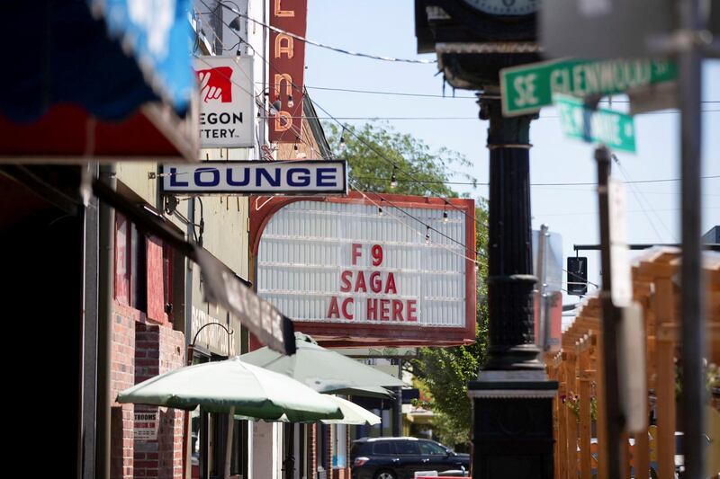 A movie theatre advertises air conditioning along with a movie during unprecedented heat wave in Portland, Oregon, U.S. June 27, 2021. REUTERS/Maranie Staab